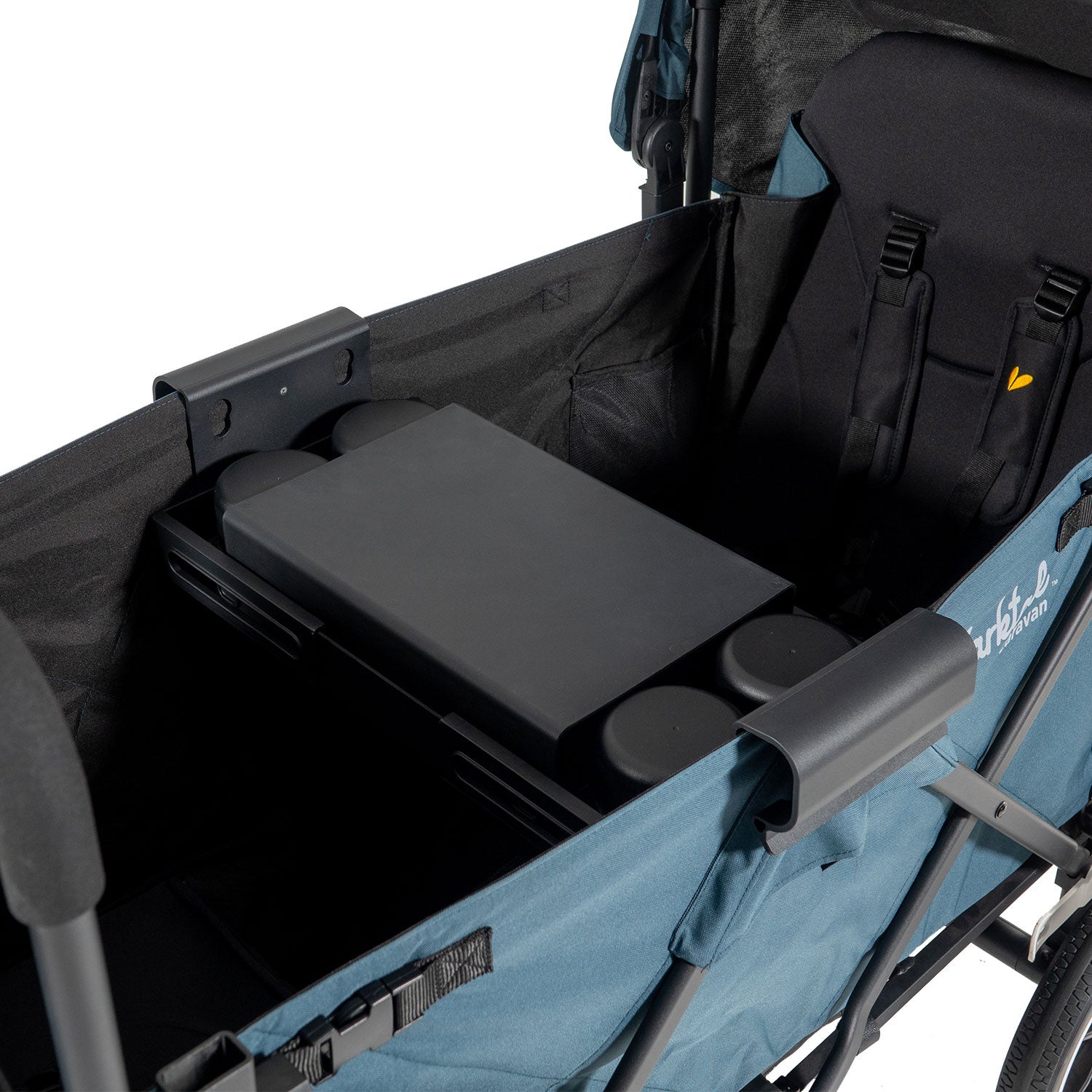 snack tray setup as a flat surface in blue stroller wagon ready for children to draw or play